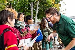 Faculty Asher Pacht of Clarkson's Beacon Institute with students for the k-12 programs